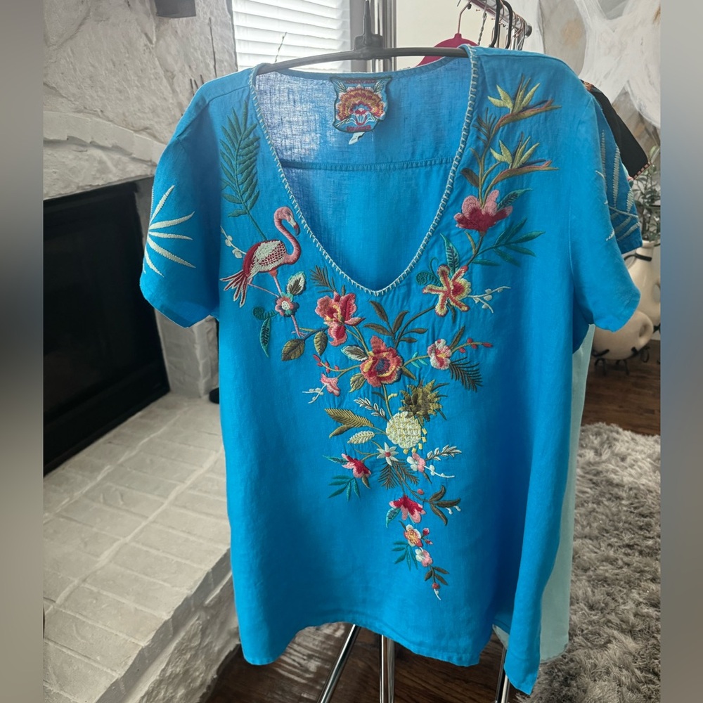 Johnny was shirt L